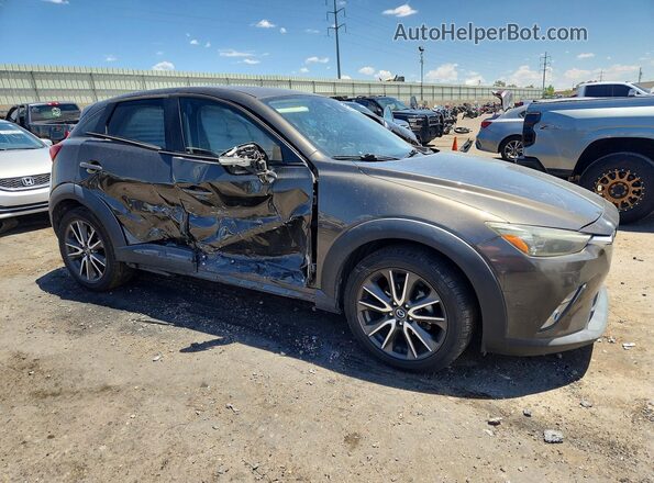 JM1DKDD79G0134106 2016 MAZDA CX-3 Gray Delantero derecho