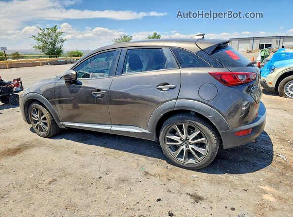 JM1DKDD79G0134106 2016 MAZDA CX-3 Gray Trasero izquierdo