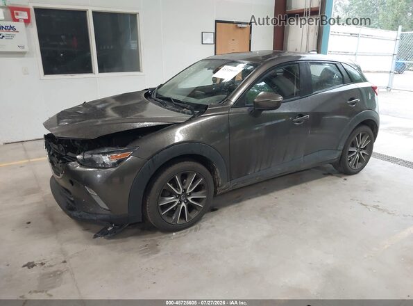 JM1DKFC70H0170863 2017 MAZDA CX-3 Brown Vista tres cuartos delantera izquierda