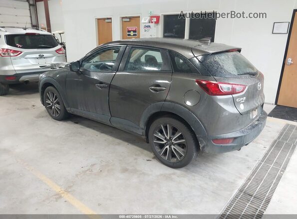 JM1DKFC70H0170863 2017 MAZDA CX-3 Brown Trasero izquierdo