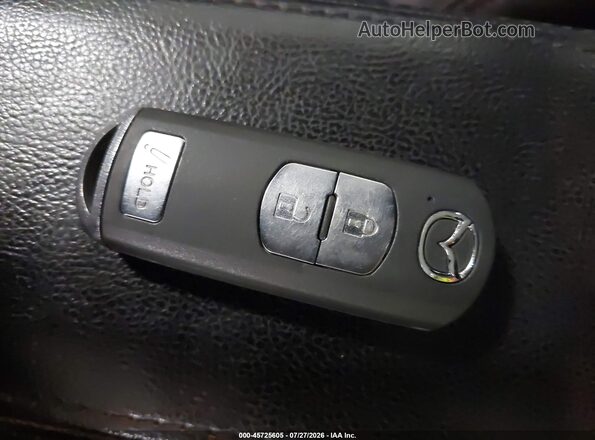 JM1DKFC70H0170863 2017 MAZDA CX-3 Brown Vista del salpicadero
