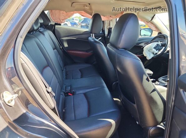 JM1DKFC72H0161419 2017 MAZDA CX-3 Серый Вид задних сидений