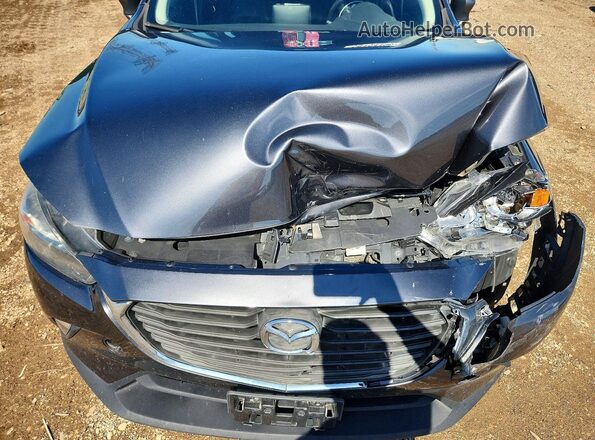 JM1DKFC72H0161419 2017 MAZDA CX-3 Серый Вид задней части салона