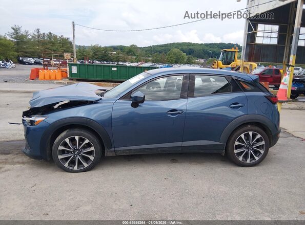 JM1DKFC72K1453167 2019 MAZDA CX-3 Blue Widok wnętrza z tyłu