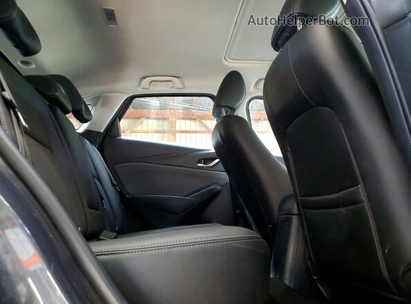 JM1DKFC73K0430437 2019 MAZDA CX-3 Gray Vista de los asientos traseros