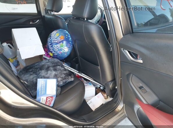 JM1DKFC77J0303978 2018 MAZDA CX-3 Gray Vista de la etiqueta del VIN