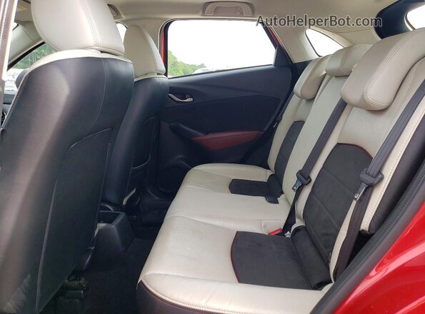 JM1DKFD77J0331164 2018 MAZDA CX-3 Red Rear seats view