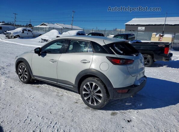 JM1DKFD77M1511047 2021 MAZDA CX-3 Silver Trasero izquierdo