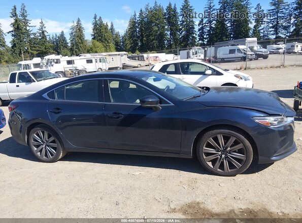 JM1GL1VM1J1316123 2018 MAZDA 6 Blue Vista interior trasera