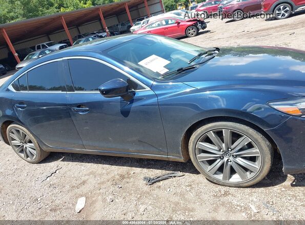 JM1GL1VM1J1329731 2018 MAZDA 6 Blue Vista interior trasera