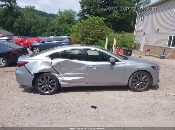 JM1GL1VM6J1313735 2018 MAZDA 6 Silver Vista interior trasera