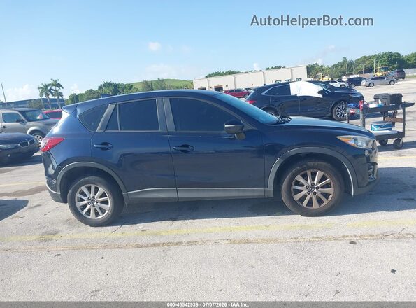 JM3KE2BY7G0876395 2016 MAZDA CX-5 Blue Widok wnętrza z tyłu