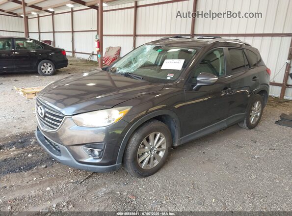 JM3KE2CY1G0629906 2016 MAZDA CX-5 Gray Vista tres cuartos delantera izquierda