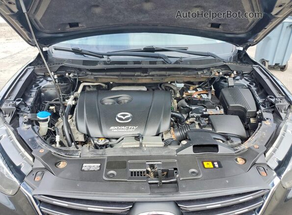 JM3KE2CY1G0725468 2016 MAZDA CX-5 Black Widok wnętrza z tyłu