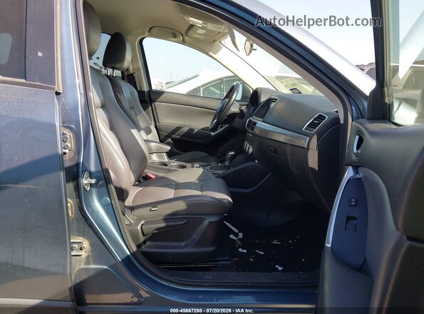 JM3KE2CY2G0818225 2016 MAZDA CX-5 Teal წინა სალონის ხედი