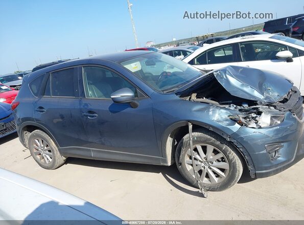 JM3KE2CY2G0818225 2016 MAZDA CX-5 Teal უკანა სალონის ხედი