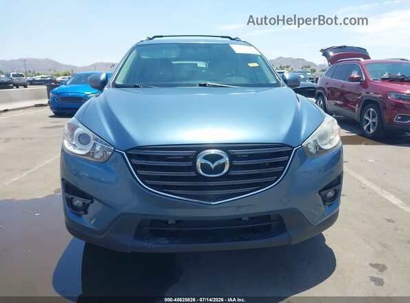 JM3KE2CY3G0629194 2016 MAZDA CX-5 Blue Սալոնի հետևի տեսք