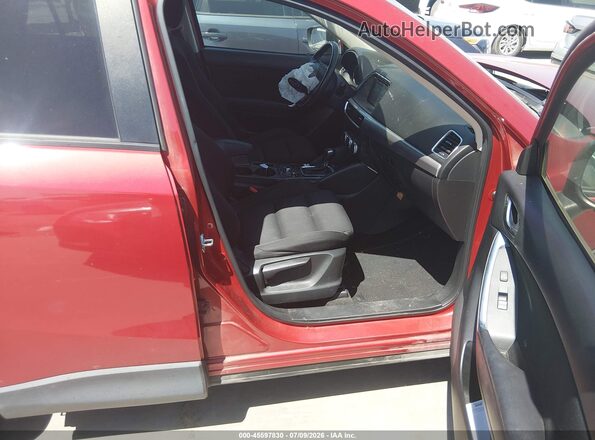 JM3KE2CY3G0692232 2016 MAZDA CX-5 Maroon Widok wnętrza z przodu