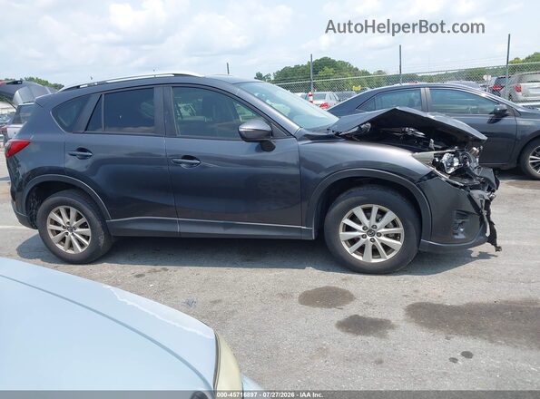 JM3KE2CY5G0701299 2016 MAZDA CX-5 Gray Widok wnętrza z tyłu