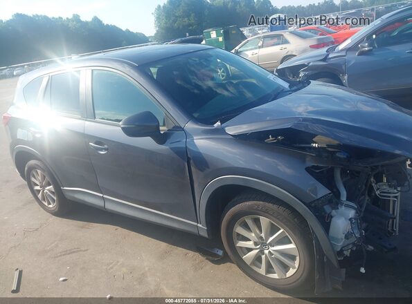 JM3KE2CYXG0689120 2016 MAZDA CX-5 Gray Widok wnętrza 360 stopni