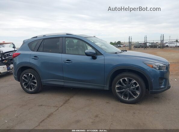 JM3KE2DY2G0650939 2016 MAZDA CX-5 Blue Widok wnętrza z tyłu