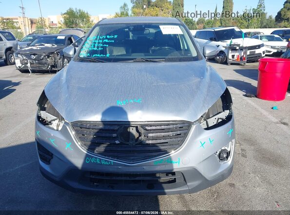 JM3KE2DY6G0690392 2016 MAZDA CX-5 Silver Вид задньої частини салону