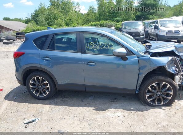 JM3KE2DY6G0813060 2016 MAZDA CX-5 Dark Blue Widok wnętrza z tyłu
