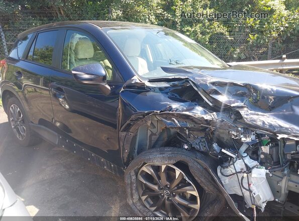 JM3KE2DY9G0763481 2016 MAZDA CX-5 Blue Widok wnętrza z tyłu