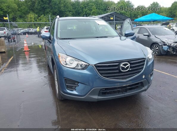 JM3KE4BY5G0769227 2016 MAZDA CX-5 Light Blue Vista frontal