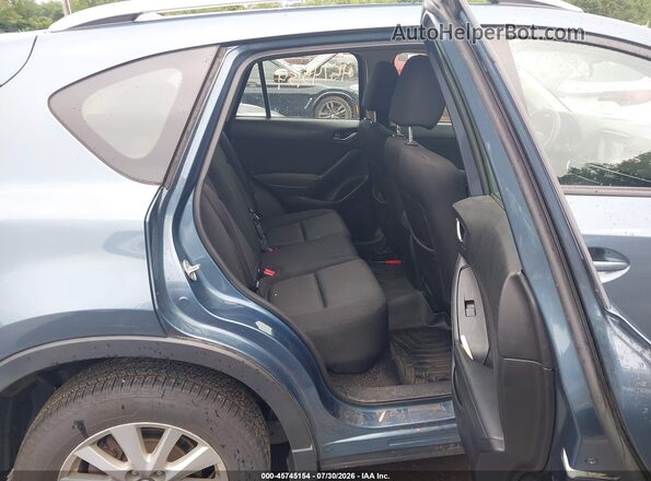 JM3KE4BY5G0769227 2016 MAZDA CX-5 Light Blue Vista de la etiqueta del VIN