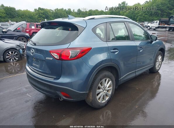 JM3KE4BY5G0769227 2016 MAZDA CX-5 Light Blue Trasero derecho