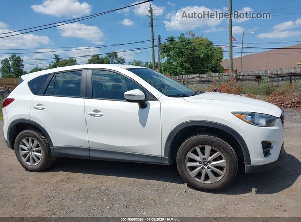 JM3KE4BY6G0891143 2016 MAZDA CX-5 White Rear interior view