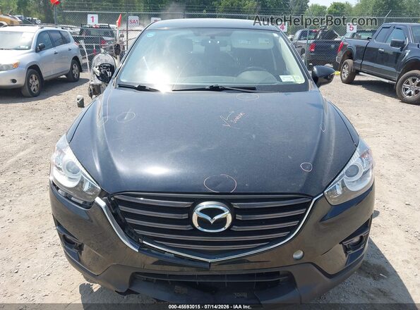 JM3KE4CY0G0784846 2016 MAZDA CX-5 Black Rear interior view