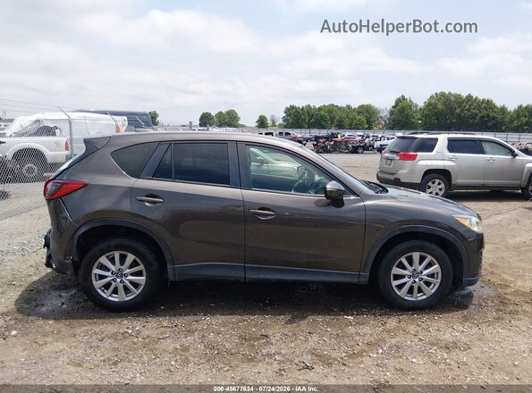 JM3KE4CY2G0785691 2016 MAZDA CX-5 Brown Widok wnętrza z tyłu