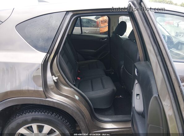 JM3KE4CY2G0785691 2016 MAZDA CX-5 Brown Widok naklejki z numerem VIN