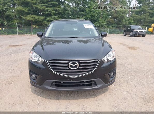 JM3KE4CY6G0757666 2016 MAZDA CX-5 Black Widok wnętrza z tyłu