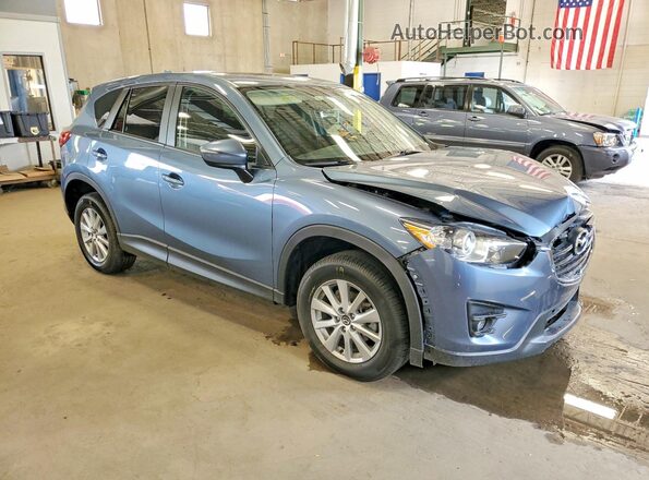 JM3KE4CY8G0805524 2016 MAZDA CX-5 Blue Delantero derecho