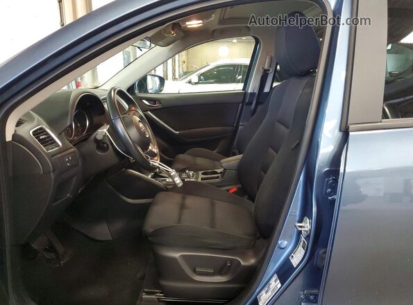 JM3KE4CY8G0805524 2016 MAZDA CX-5 Blue Vista interior delantera