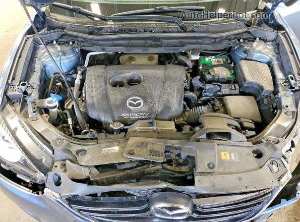 JM3KE4CY8G0805524 2016 MAZDA CX-5 Blue Vista del compartimento del motor