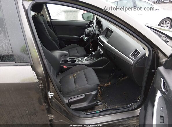 JM3KE4CYXG0670420 2016 MAZDA CX-5 Brown Вид салону спереду
