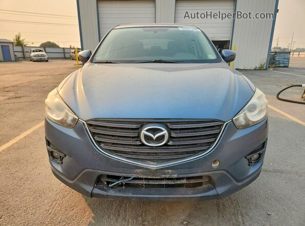 JM3KE4CYXG0829355 2016 MAZDA CX-5 Gray Front view