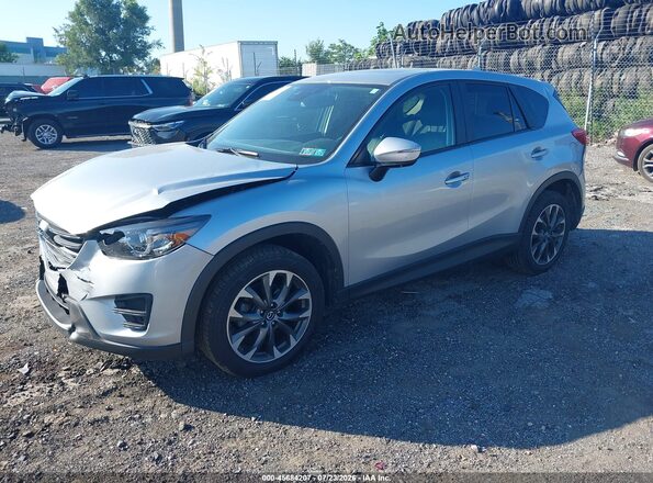 JM3KE4DY0G0713614 2016 MAZDA CX-5 Серебряный Передняя левая четверть