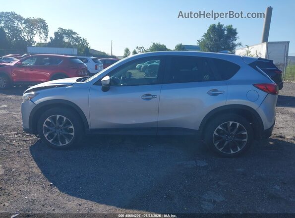 JM3KE4DY0G0713614 2016 MAZDA CX-5 Серебряный Вид задней части салона