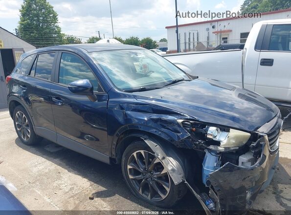 JM3KE4DY1G0778682 2016 MAZDA CX-5 Dark Blue Vista interior trasera