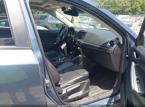 JM3KE4DY2G0680521 2016 MAZDA CX-5 Blue Вид салону спереду