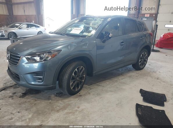 JM3KE4DY2G0713906 2016 MAZDA CX-5 Blue Front left