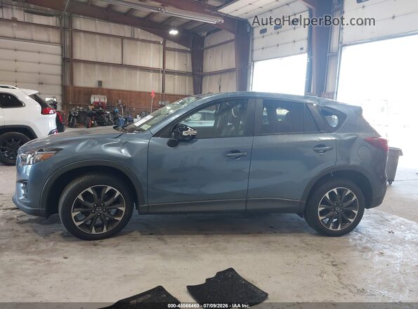 JM3KE4DY2G0713906 2016 MAZDA CX-5 Blue 360 interior view