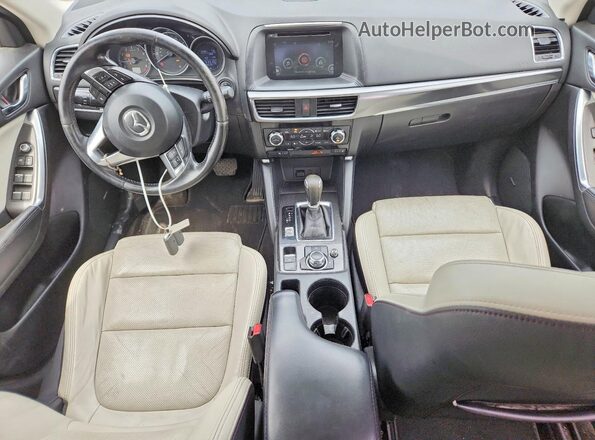 JM3KE4DY2G0719110 2016 MAZDA CX-5 White Vista del salpicadero