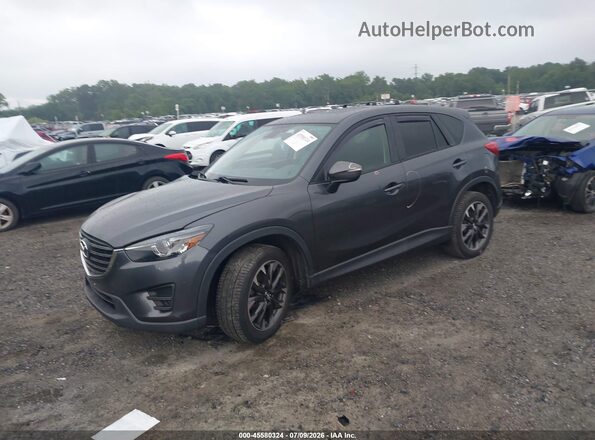 JM3KE4DY3G0681094 2016 MAZDA CX-5 Black Առջևի ձախ երեք քառորդ տեսարան
