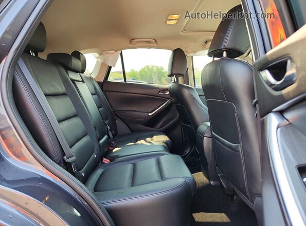 JM3KE4DY3G0907554 2016 MAZDA CX-5 Gray Vista interior trasera